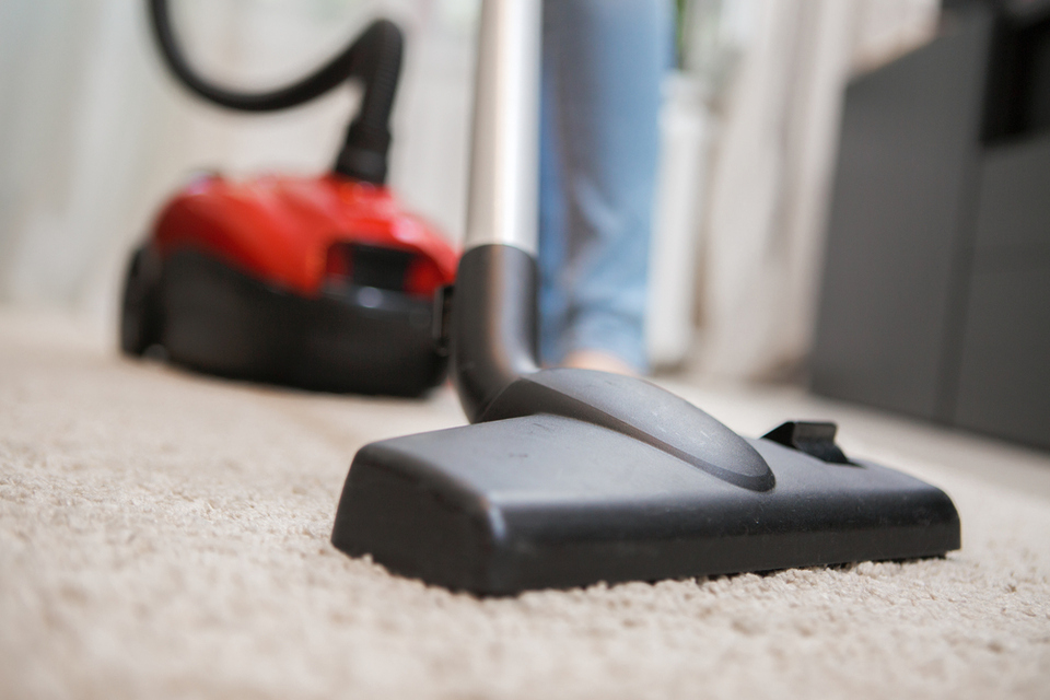 Vacuuming carpet