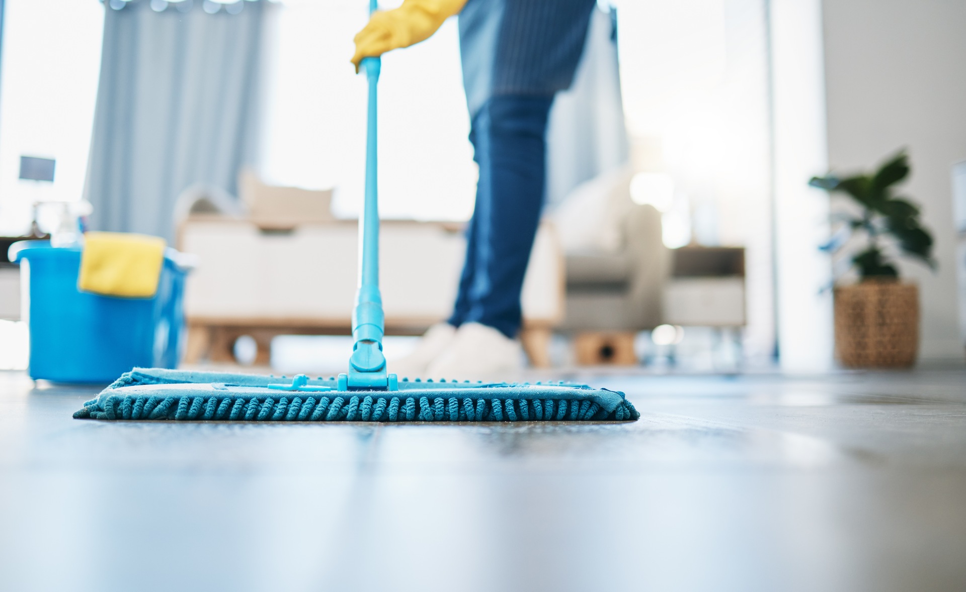 Cleaner mopping the floor